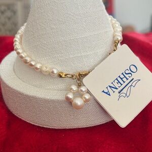 Oshena Beachwear freshwater Calla Pearl Bracelet with cat paw charm